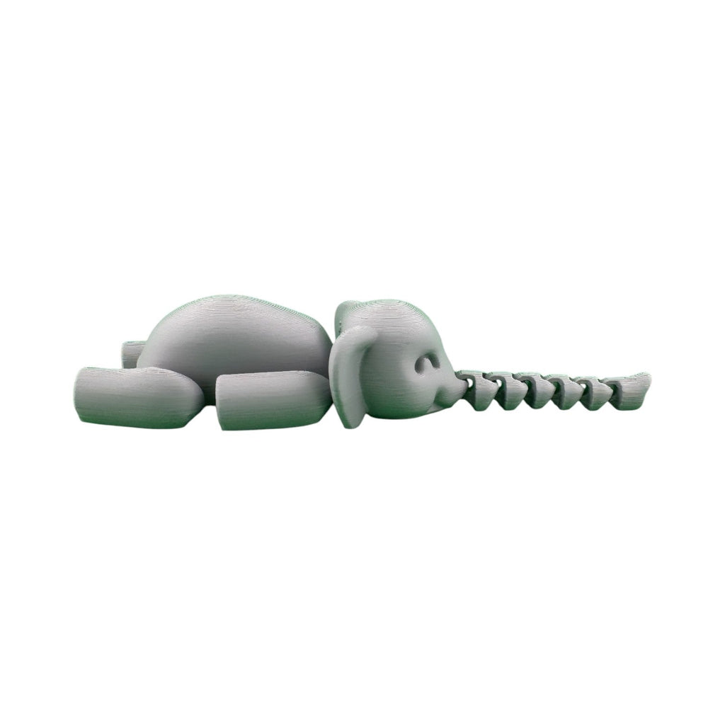 Grijze beweegbare olifant 15 x 4,5 x 3 cm – liggende pose