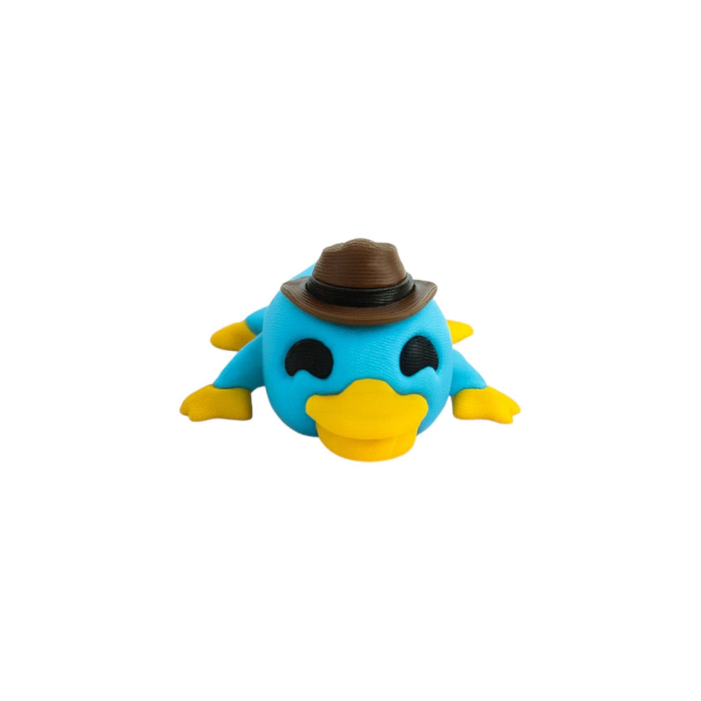 Tiny platypus lichtblauw/geel/bruin/zwart 5,5x3x1,5 cm – vooraanzicht met gele snavel