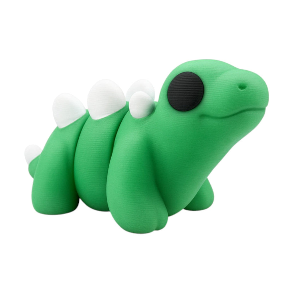 Tiny stegosaurusje groen-wit-zwart 7x3.5x3.5 cm schuin vooraanzicht